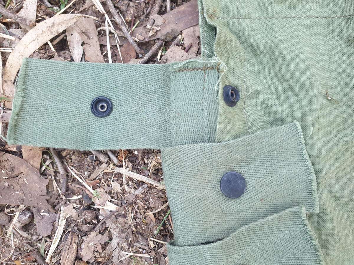 used (clean & typically discarded) SADF era green thin canvas disposable 40mm 6 round ammo bandolier