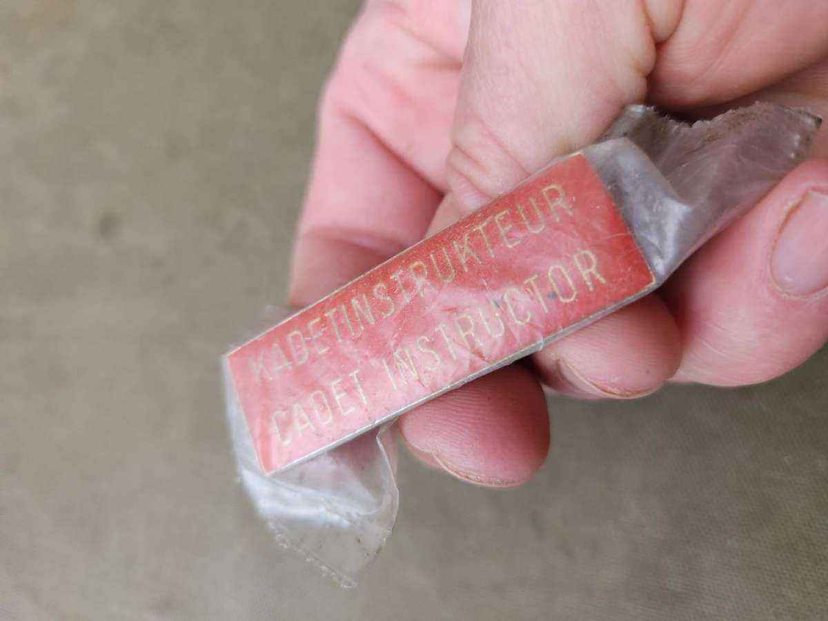 scarce SADf era RSA Schools Cadet Instructor breast badge - both rear pins intact (unused in packet)