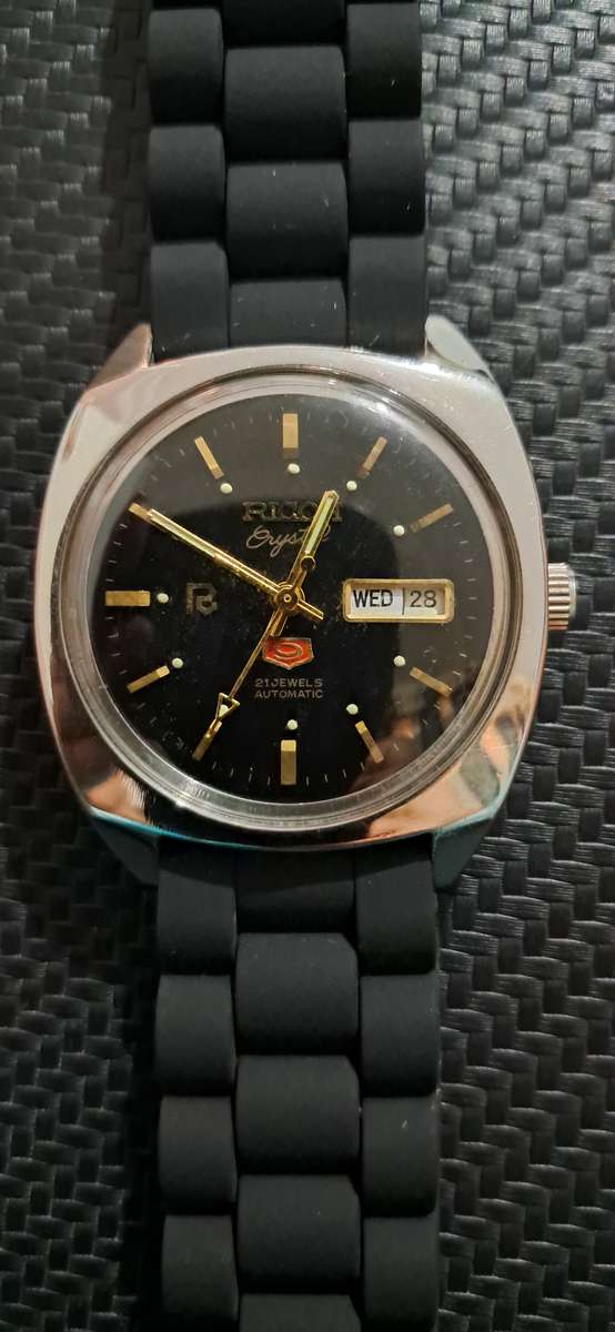 Vintage Ricoh R31 Crystal day date Automatic watch