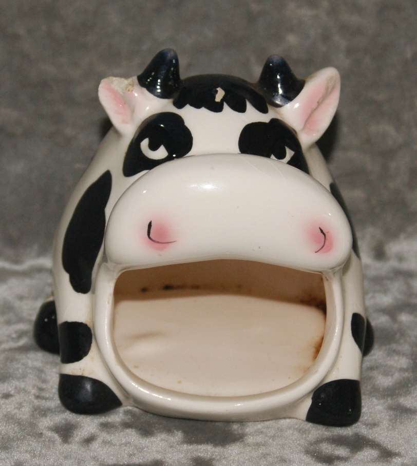 Ceramic cow shaped tea light holder (damaged)