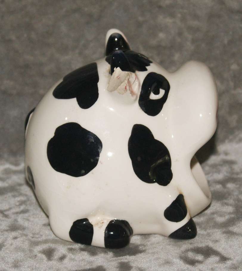 Ceramic cow shaped tea light holder (damaged)