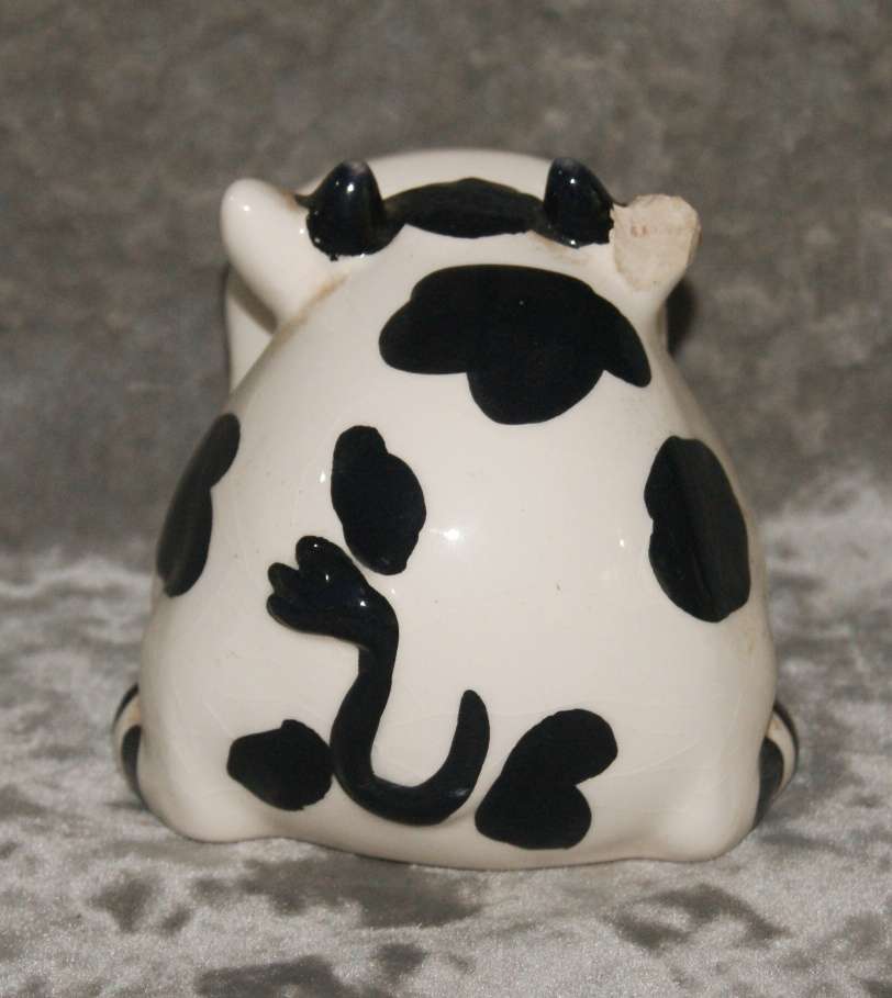 Ceramic cow shaped tea light holder (damaged)