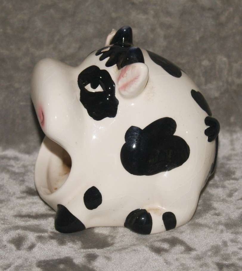 Ceramic cow shaped tea light holder (damaged)