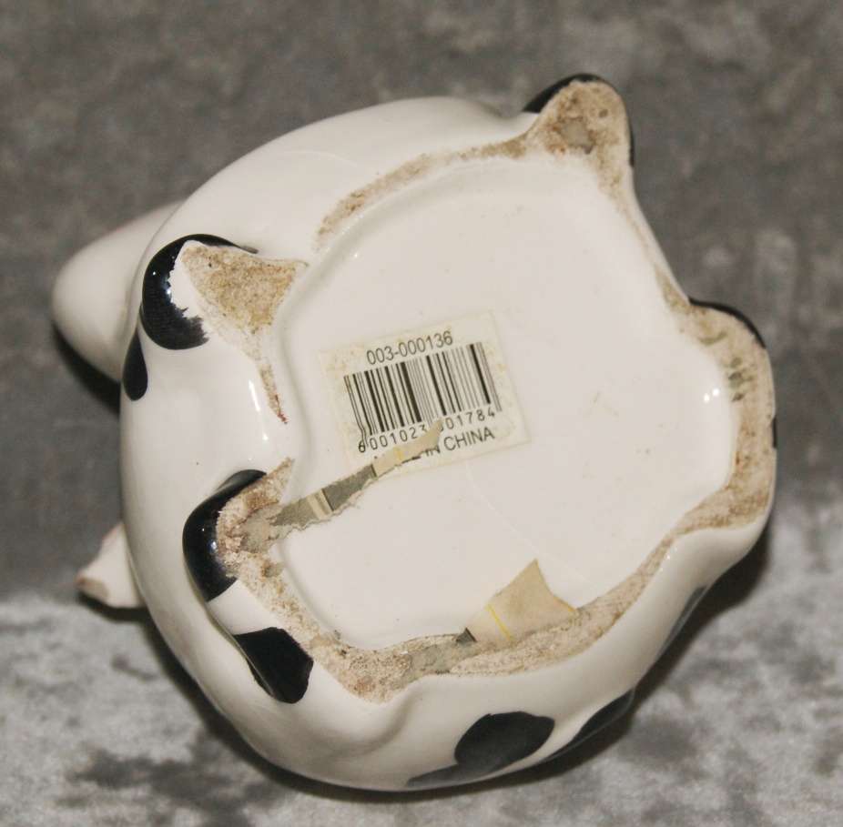 Ceramic cow shaped tea light holder (damaged)