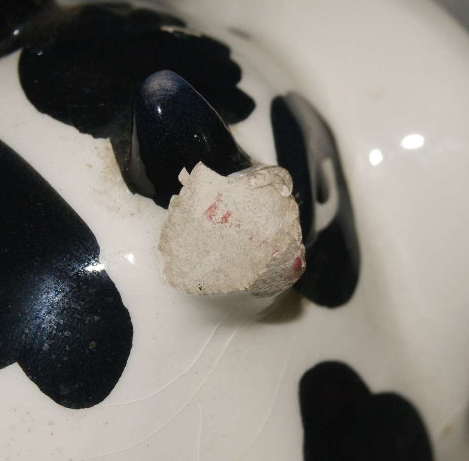 Ceramic cow shaped tea light holder (damaged)