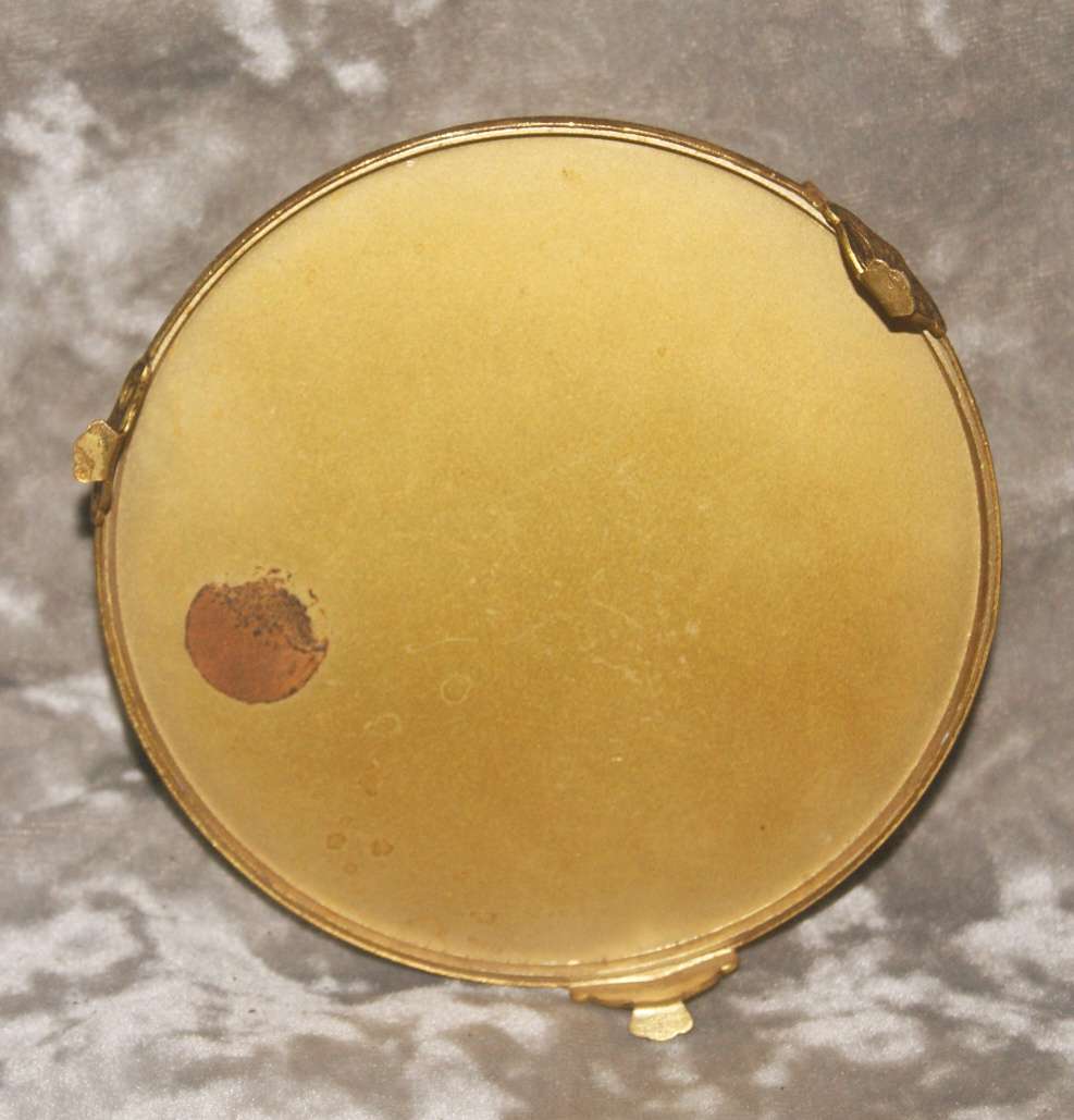 Brass footed high relief trinket box with needlepoint on lid