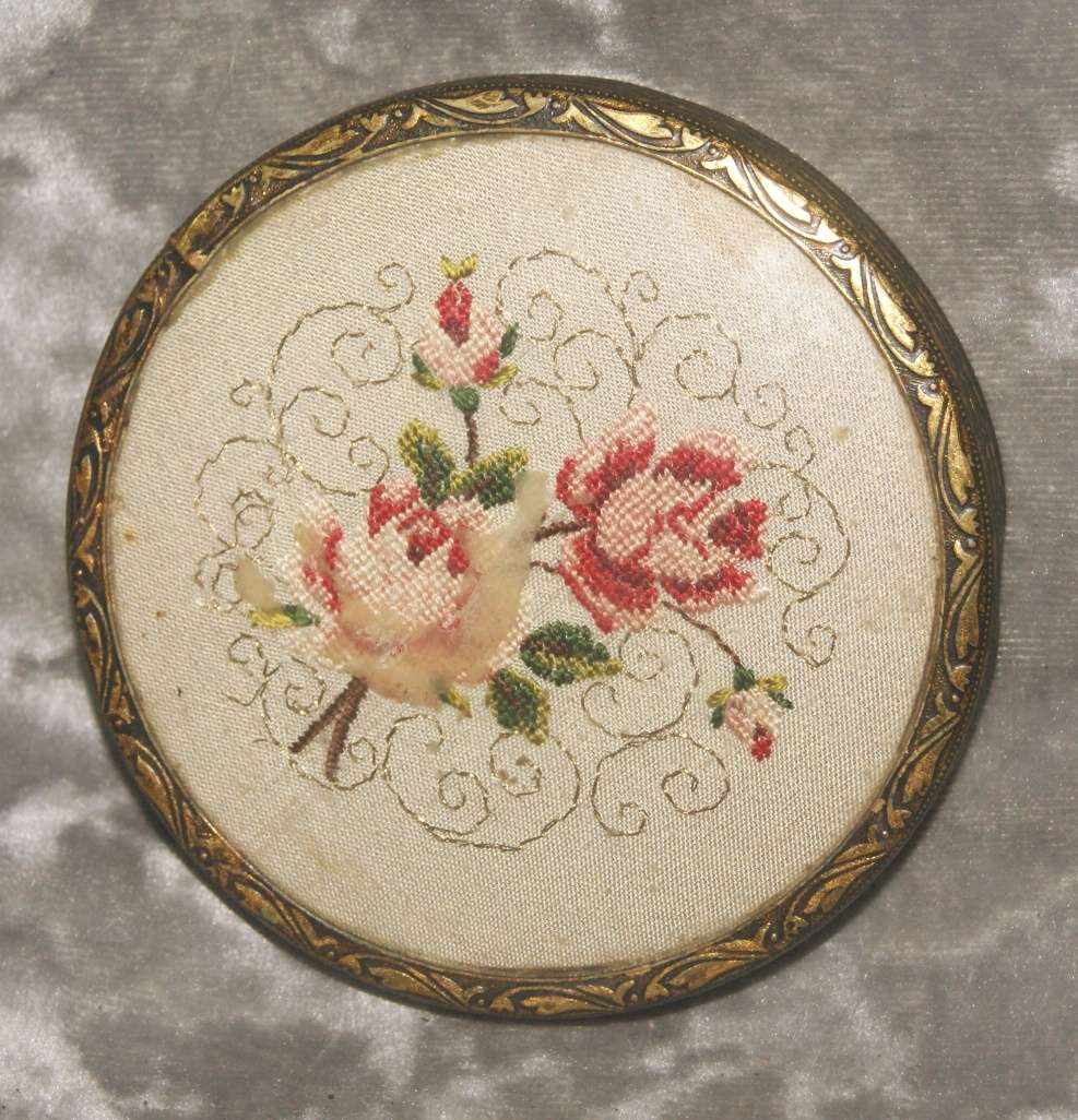 Brass high relief needlepoint lid