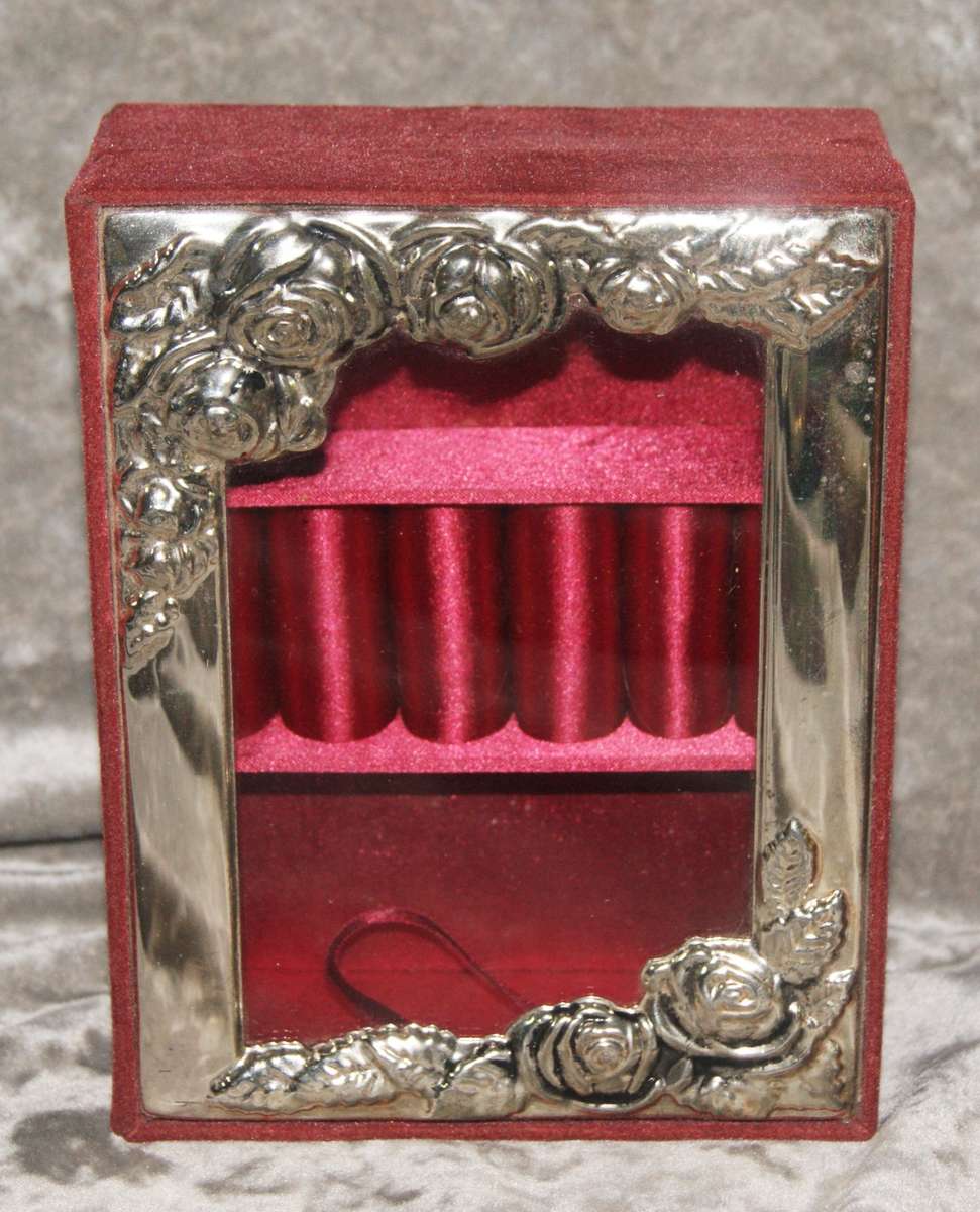 Velvet covered jewellery box with silver plate and glass lid