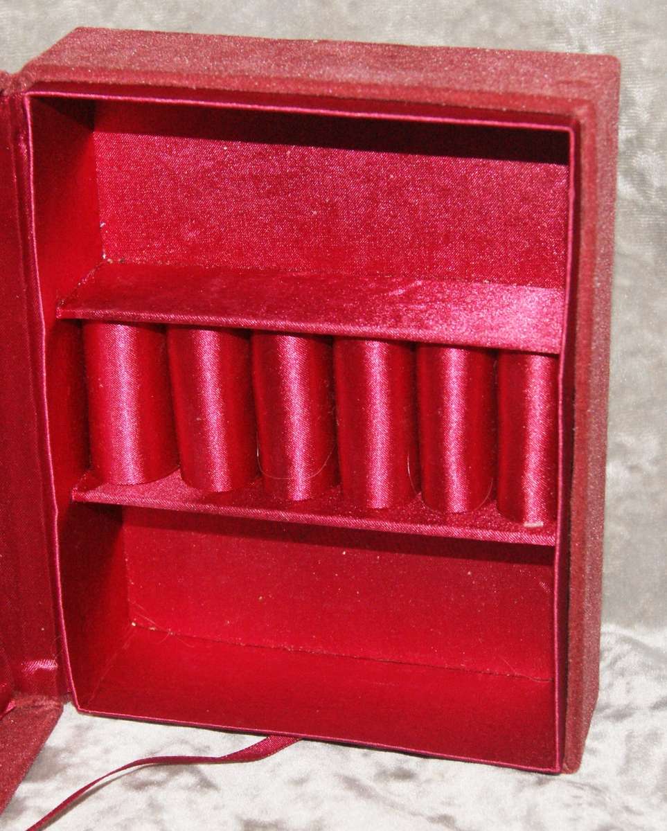 Velvet covered jewellery box with silver plate and glass lid