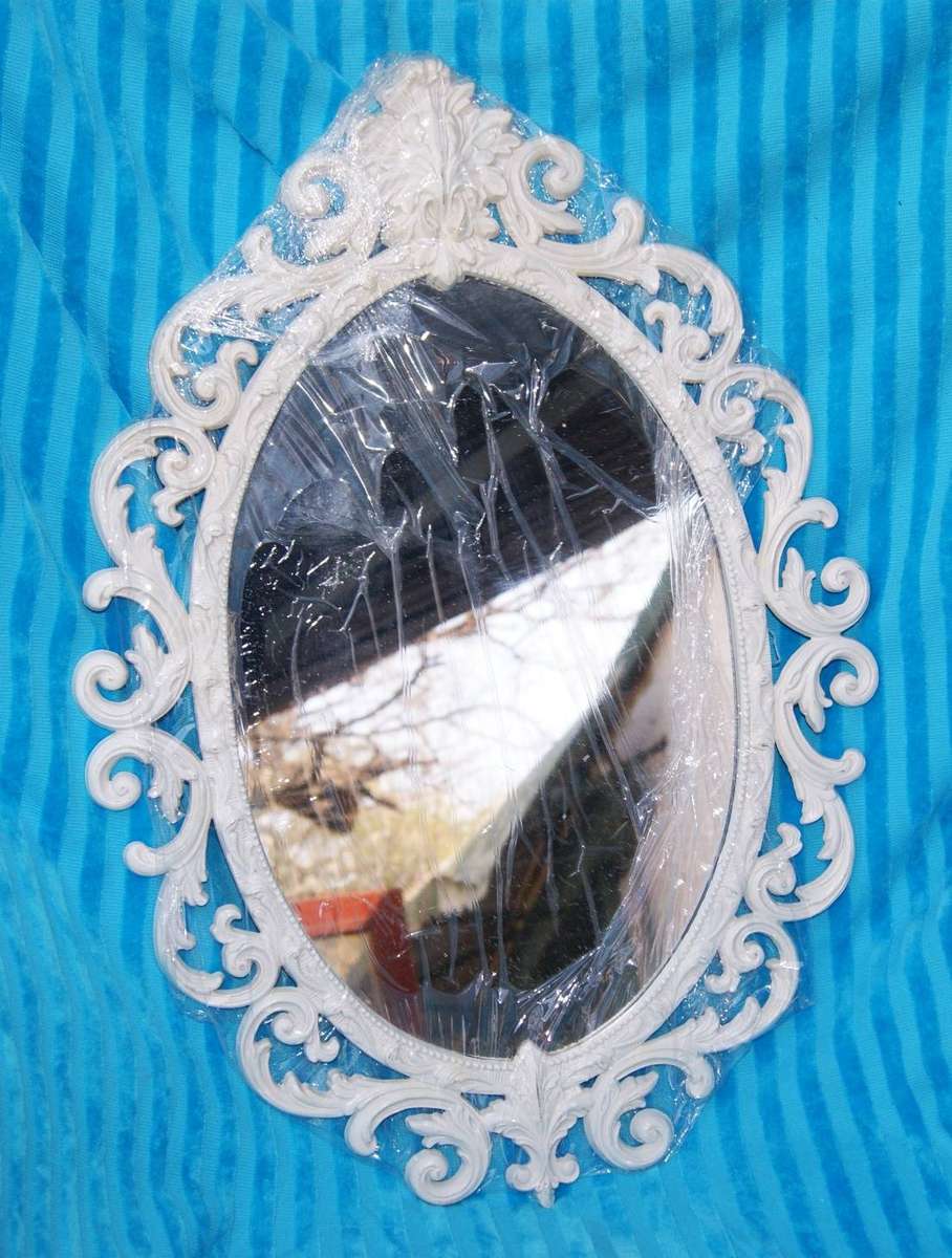 Ornate Oval Shaped Mirror