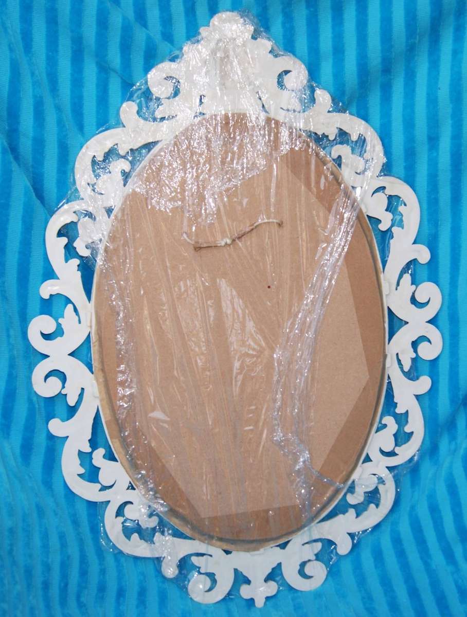 Ornate Oval Shaped Mirror