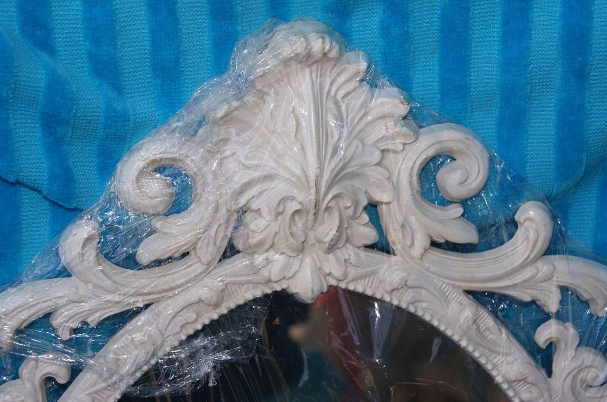 Ornate Oval Shaped Mirror