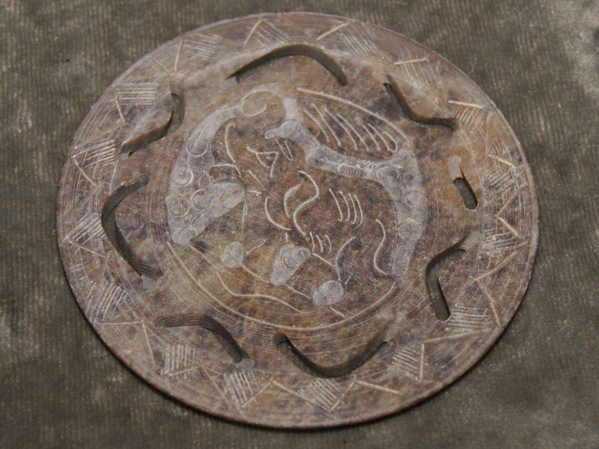Set of 3 hand carved stone coasters in holder