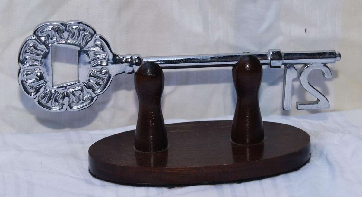 Vintage silver plated 21st key on stand @ crazy R1 start