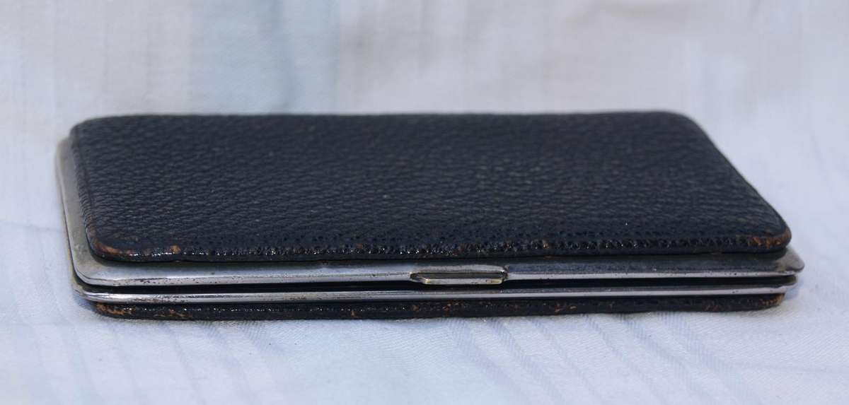 Vintage leather and chrome wallet