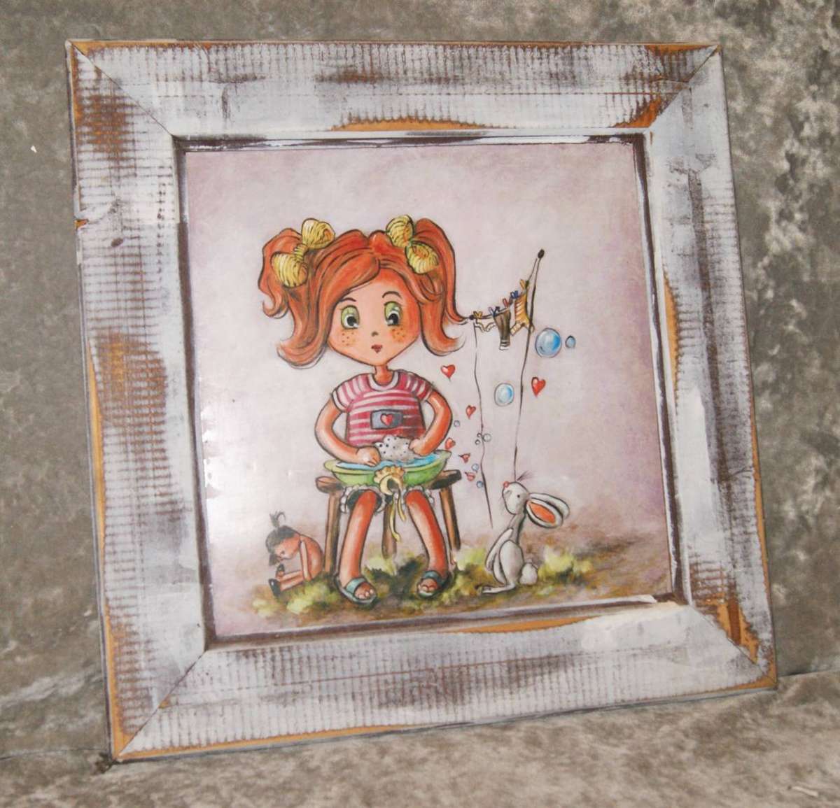 Framed Artwork of Girl with Toys
