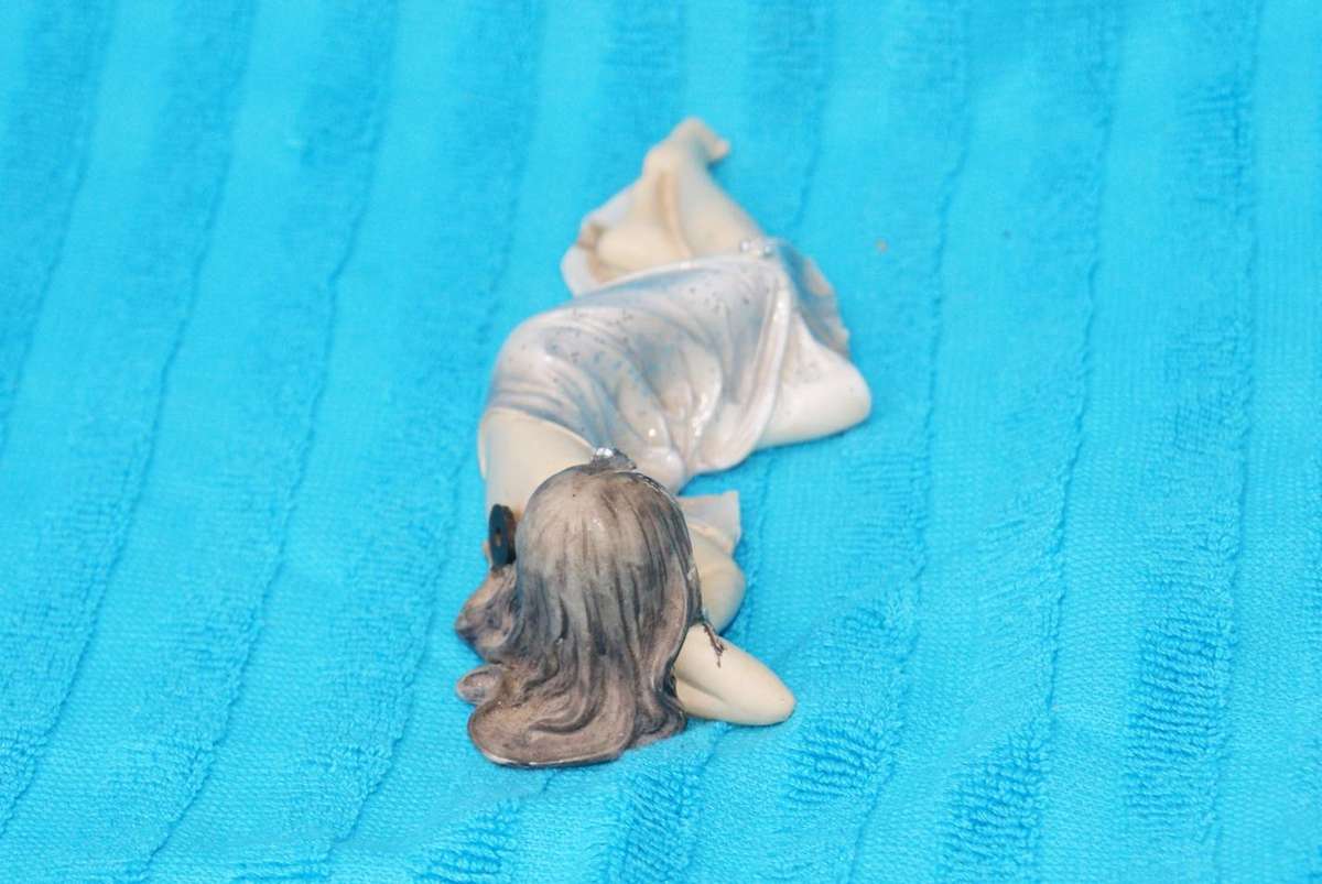 Resin Figurine of Reclining Woman