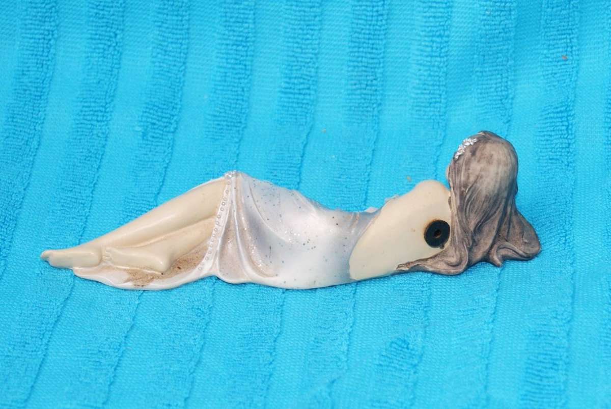 Resin Figurine of Reclining Woman