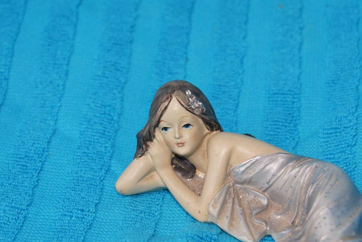 Resin Figurine of Reclining Woman