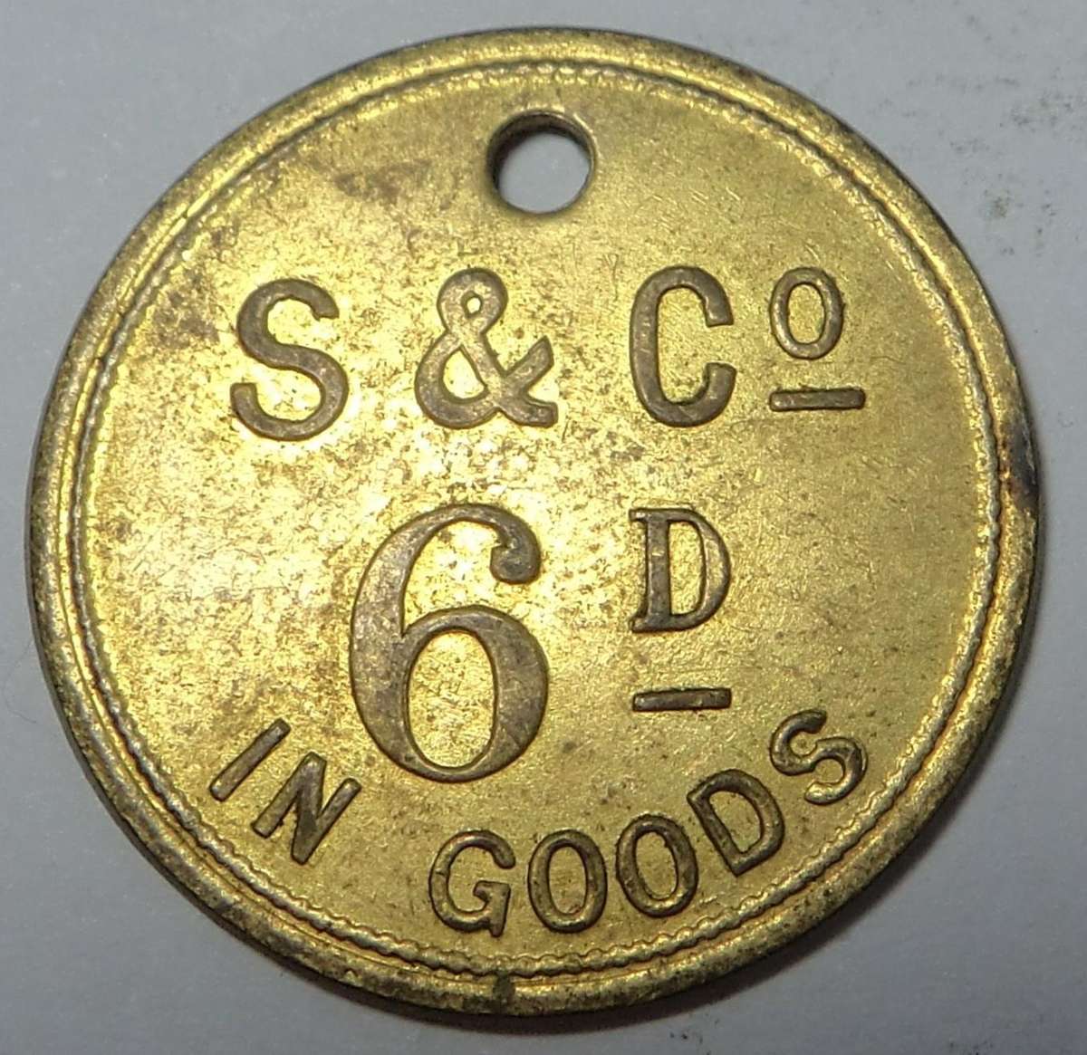 Strachan & Co 6d Token (In Goods)