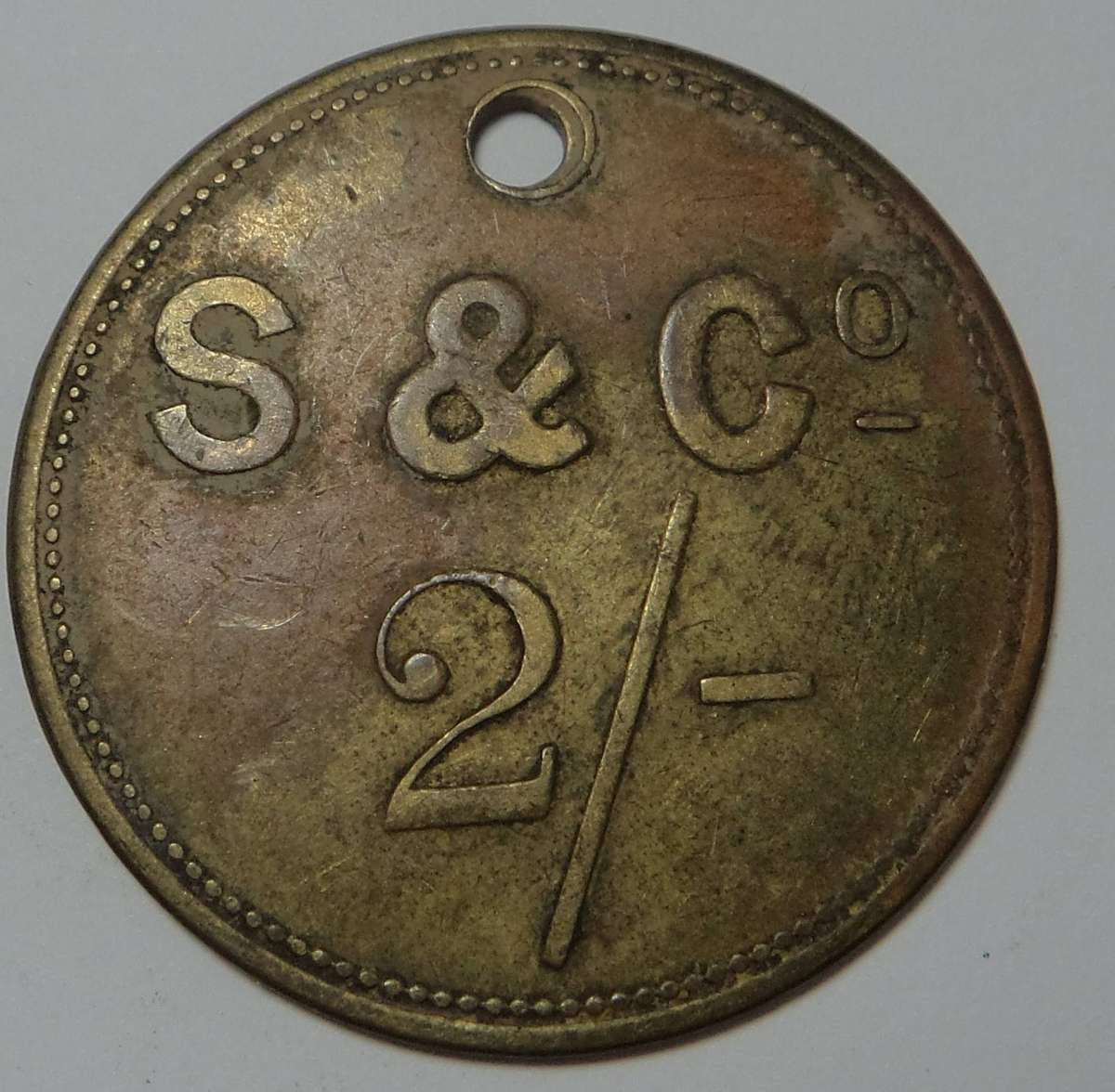 Strachan & Co 2/- Token (First Series) 2 available