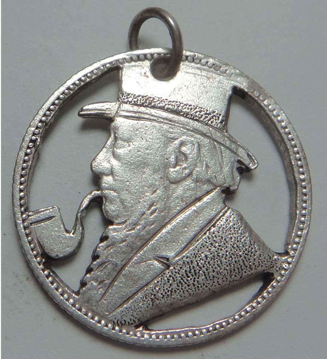 Paul Kruger ZAR Trench Art "Pipe-and-Hat" Shilling of 1894