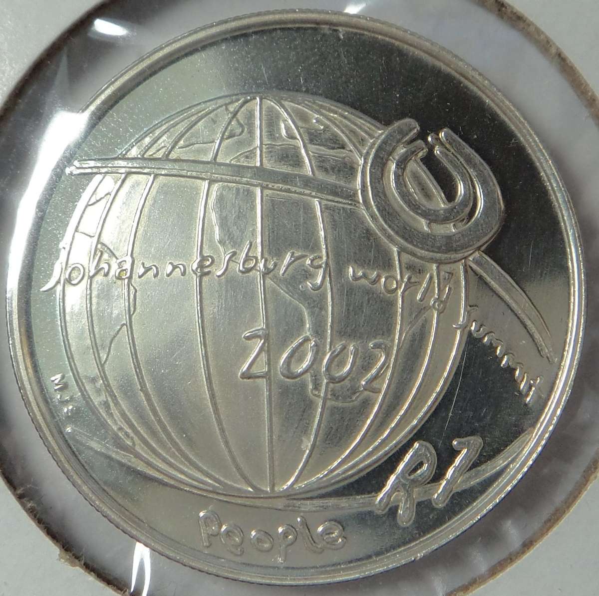 The Scarce 2002 UNC Silver R1 (JHB World Summit) Only 118 struck