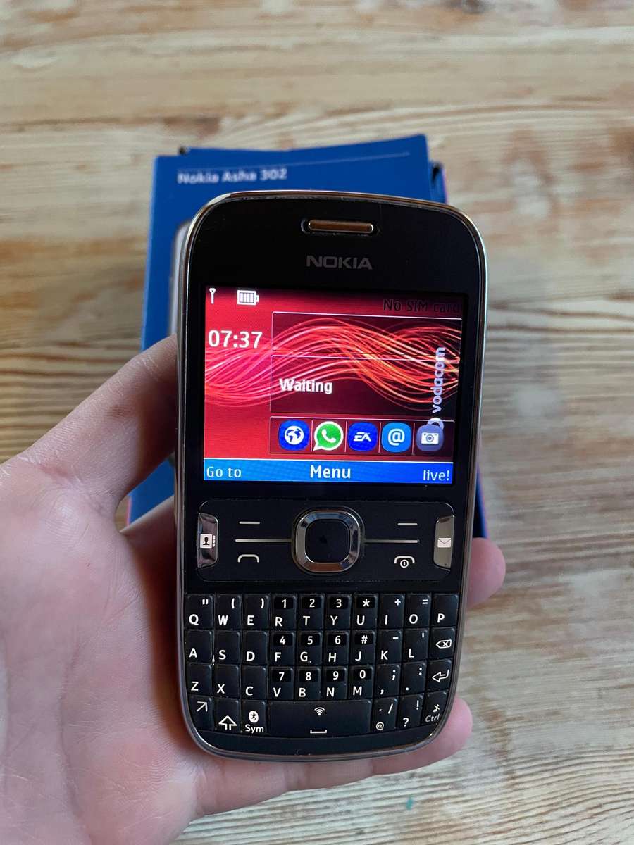 Nokia Asha 302 Working!! With box and charger