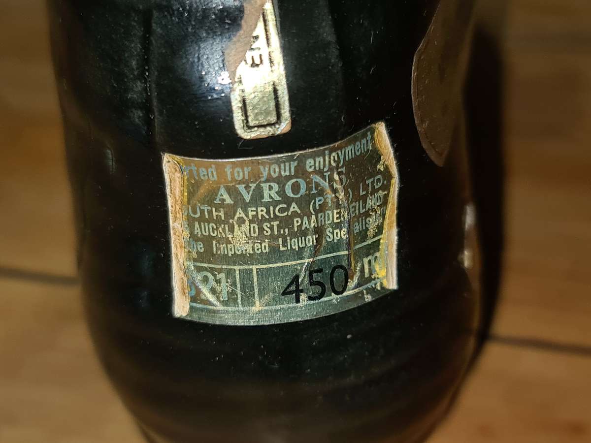 Liquor bottle in the shape of a rugby boot