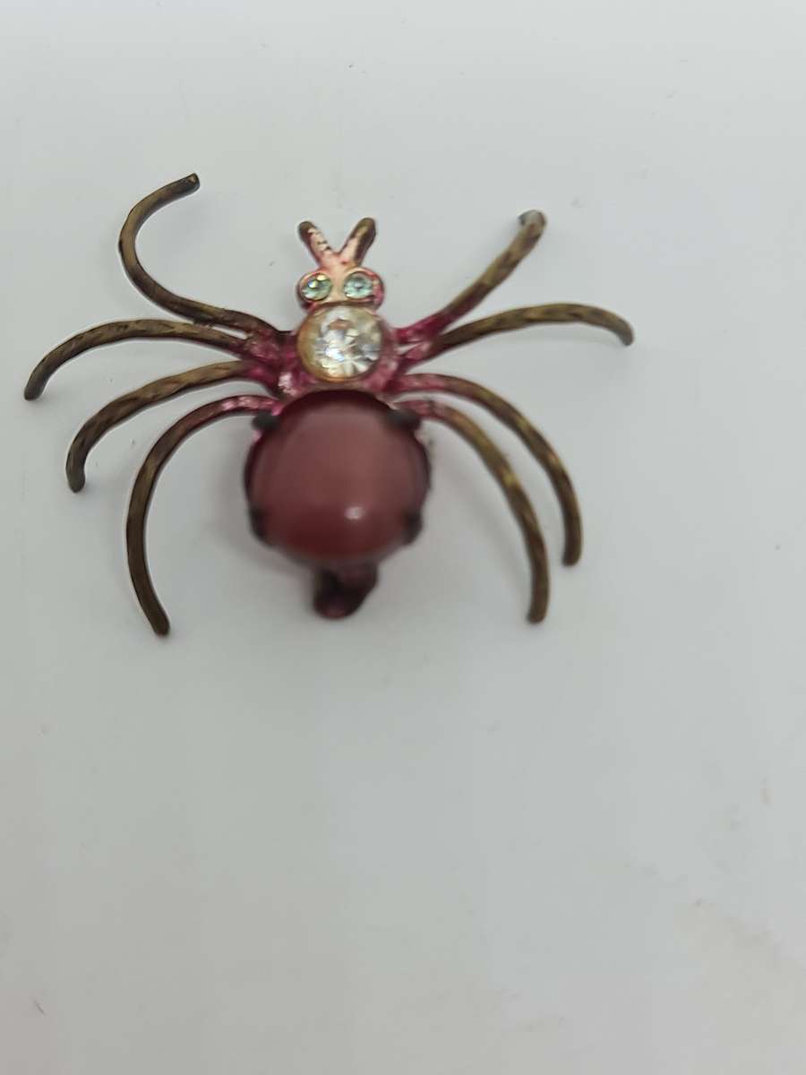 Brass tone spider brooch