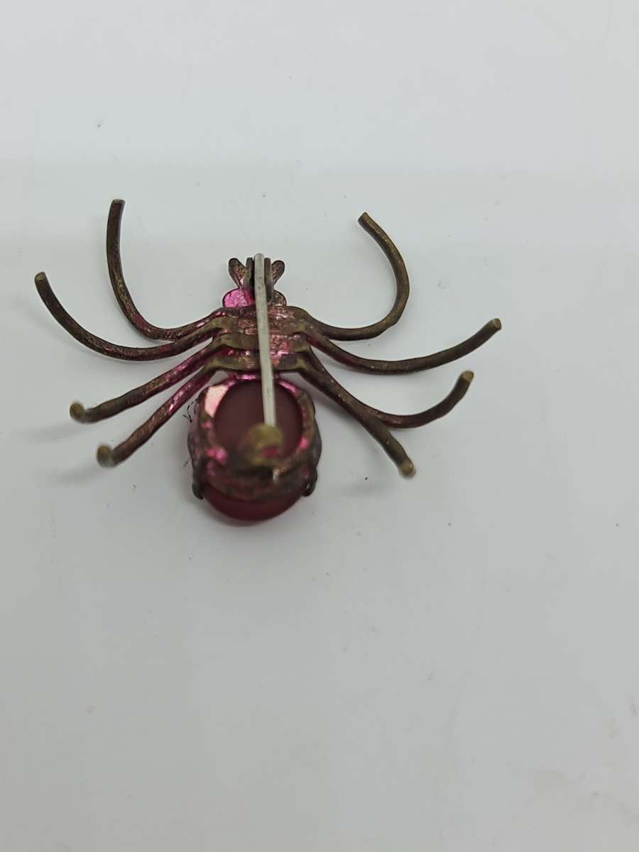 Brass tone spider brooch
