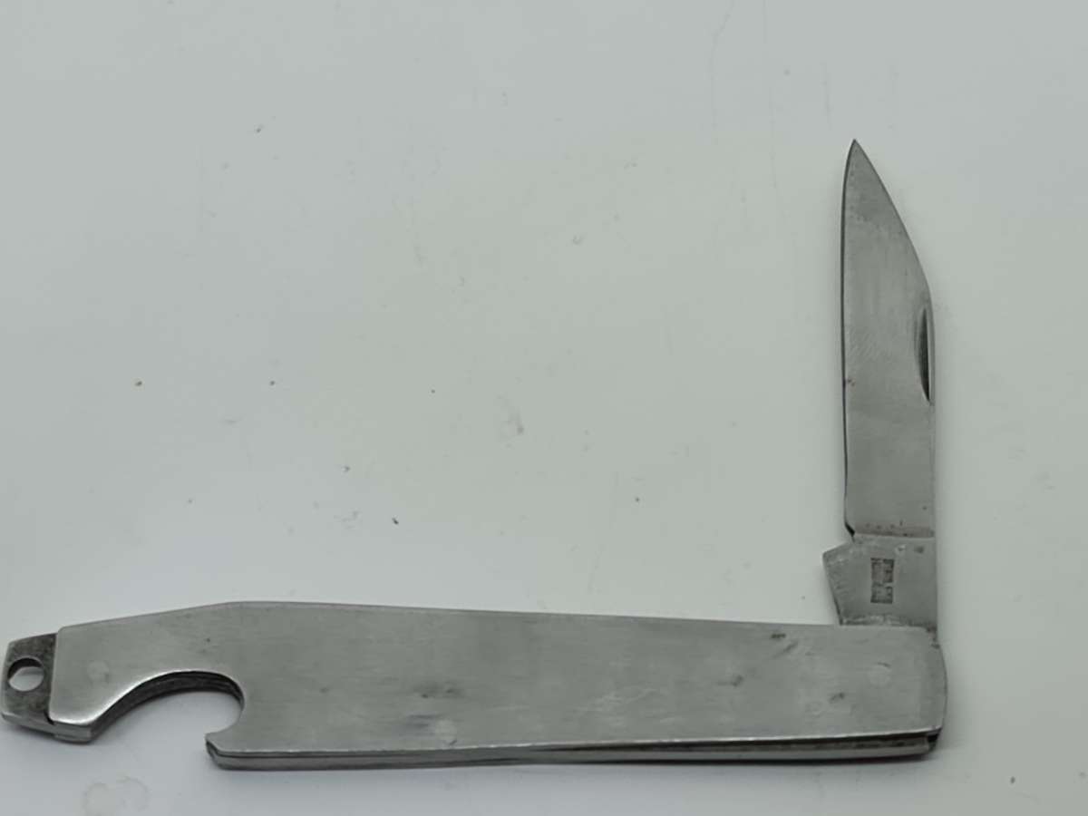 POCKET KNIFE: Stainless Hong Kong pocket knife and bottle opener