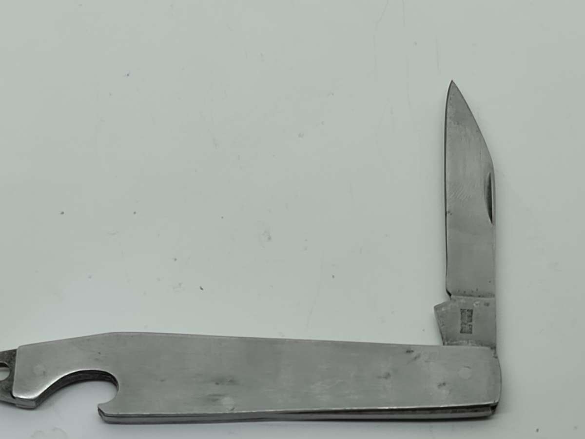 POCKET KNIFE: Stainless Hong Kong pocket knife and bottle opener