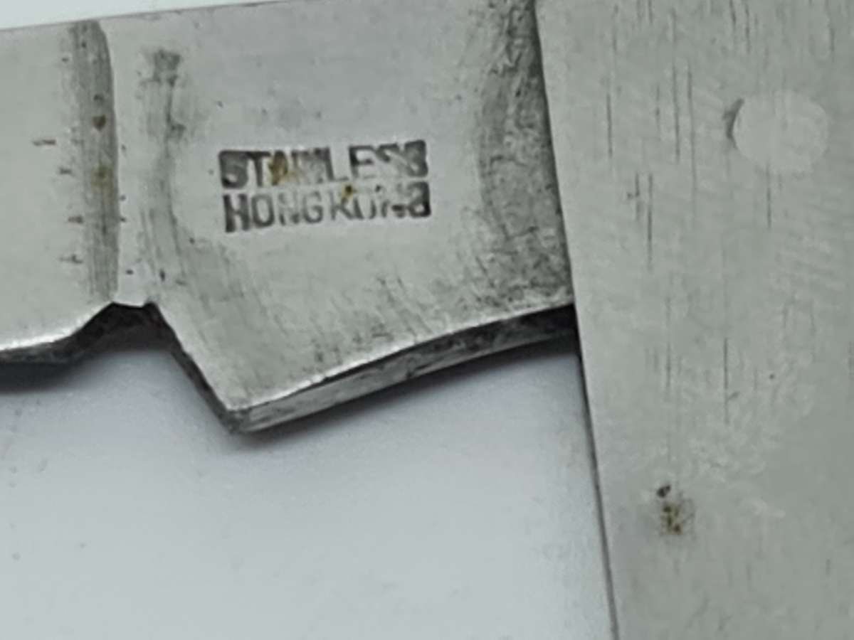 POCKET KNIFE: Stainless Hong Kong pocket knife and bottle opener