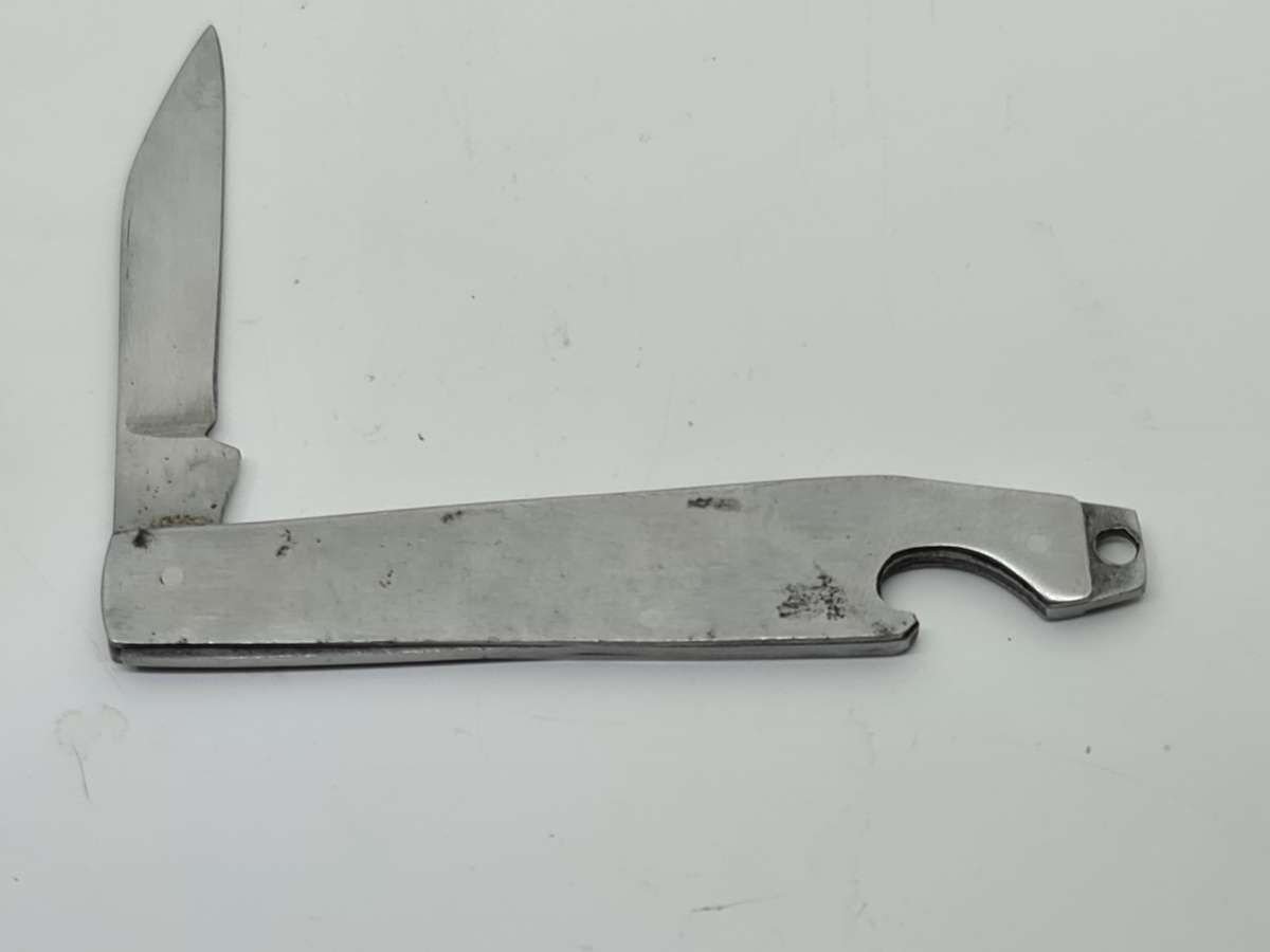 POCKET KNIFE: Stainless Hong Kong pocket knife and bottle opener