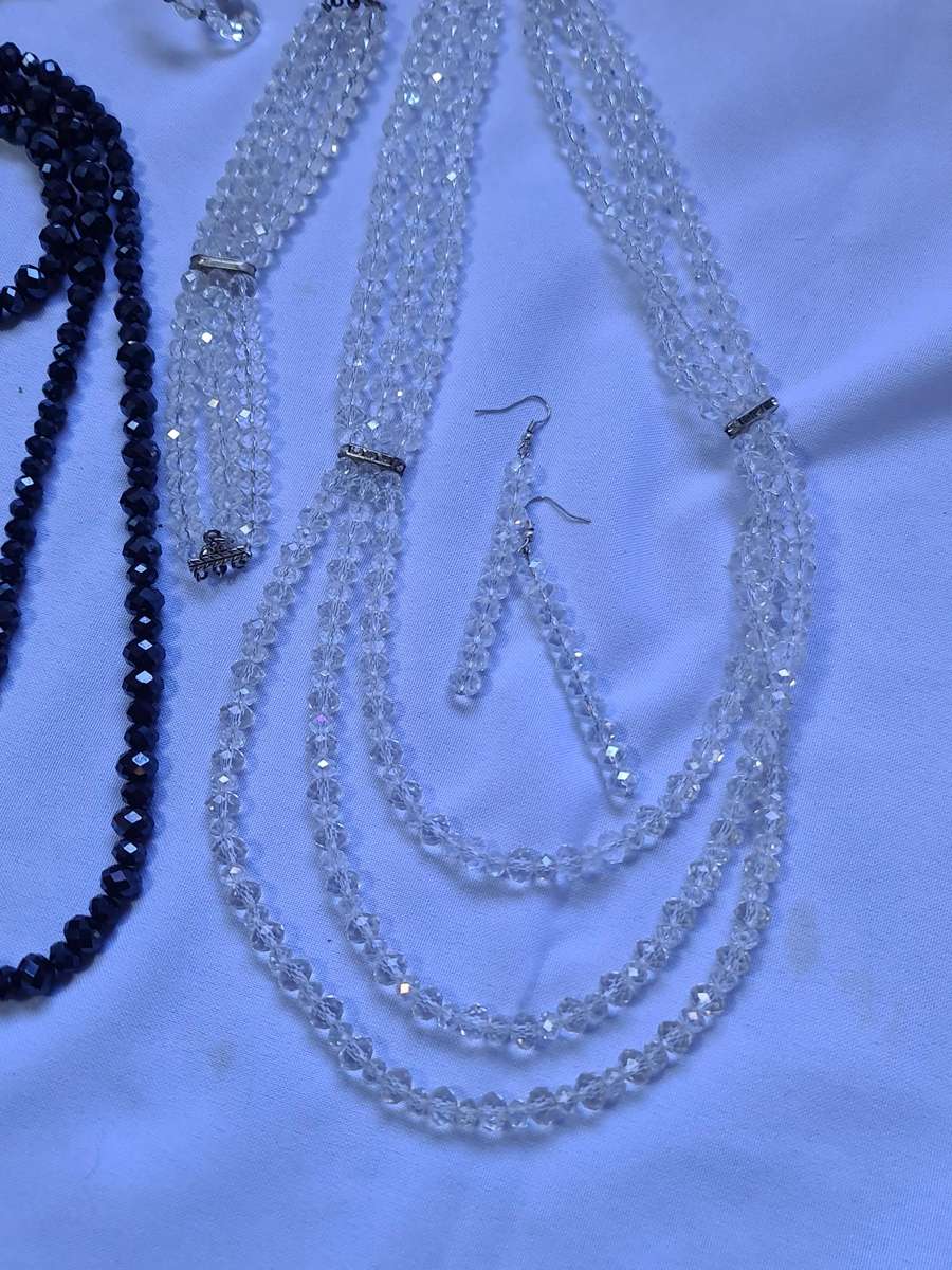 Crystal style necklaces with earrings and bracelets