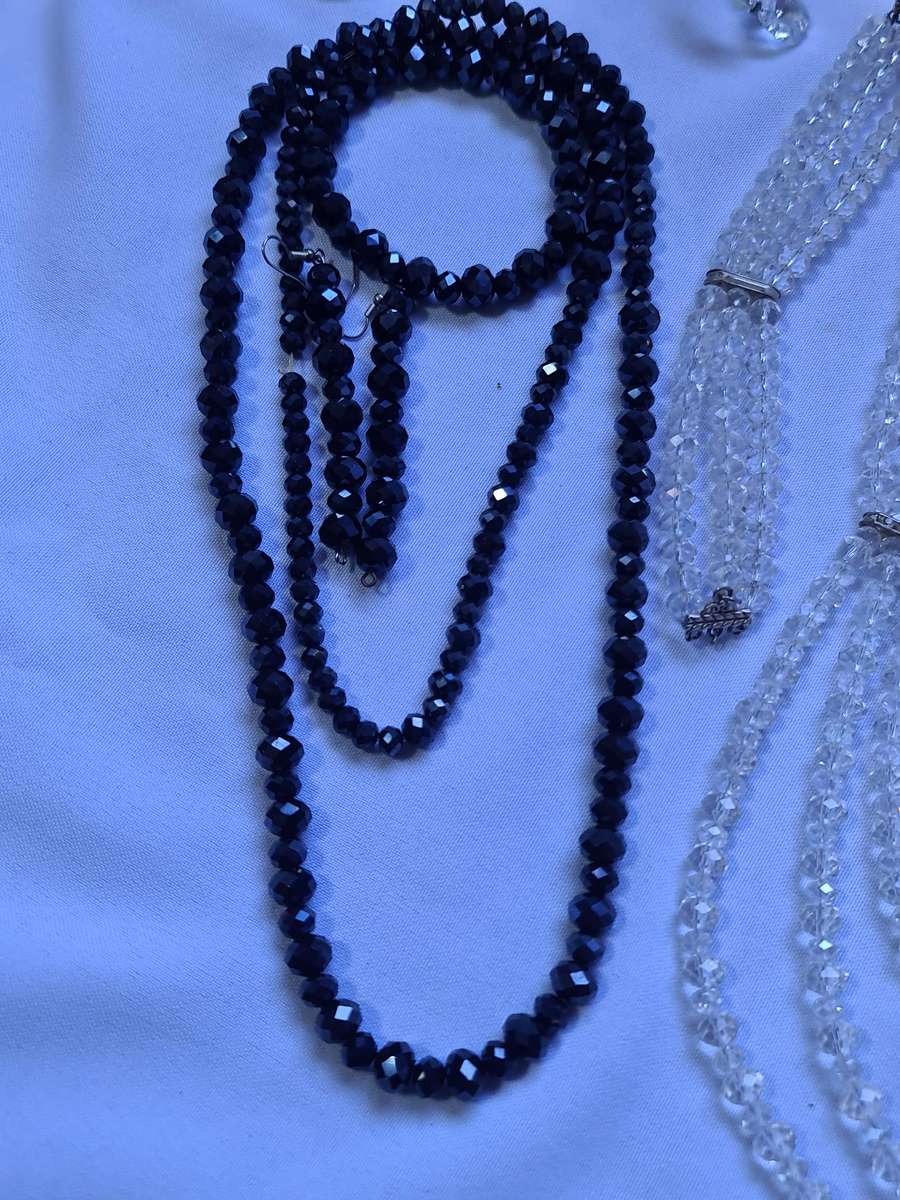 Crystal style necklaces with earrings and bracelets