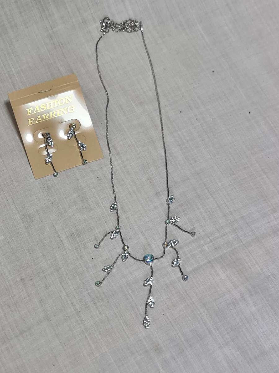 Silver Tone necklace and earrings with blue stones