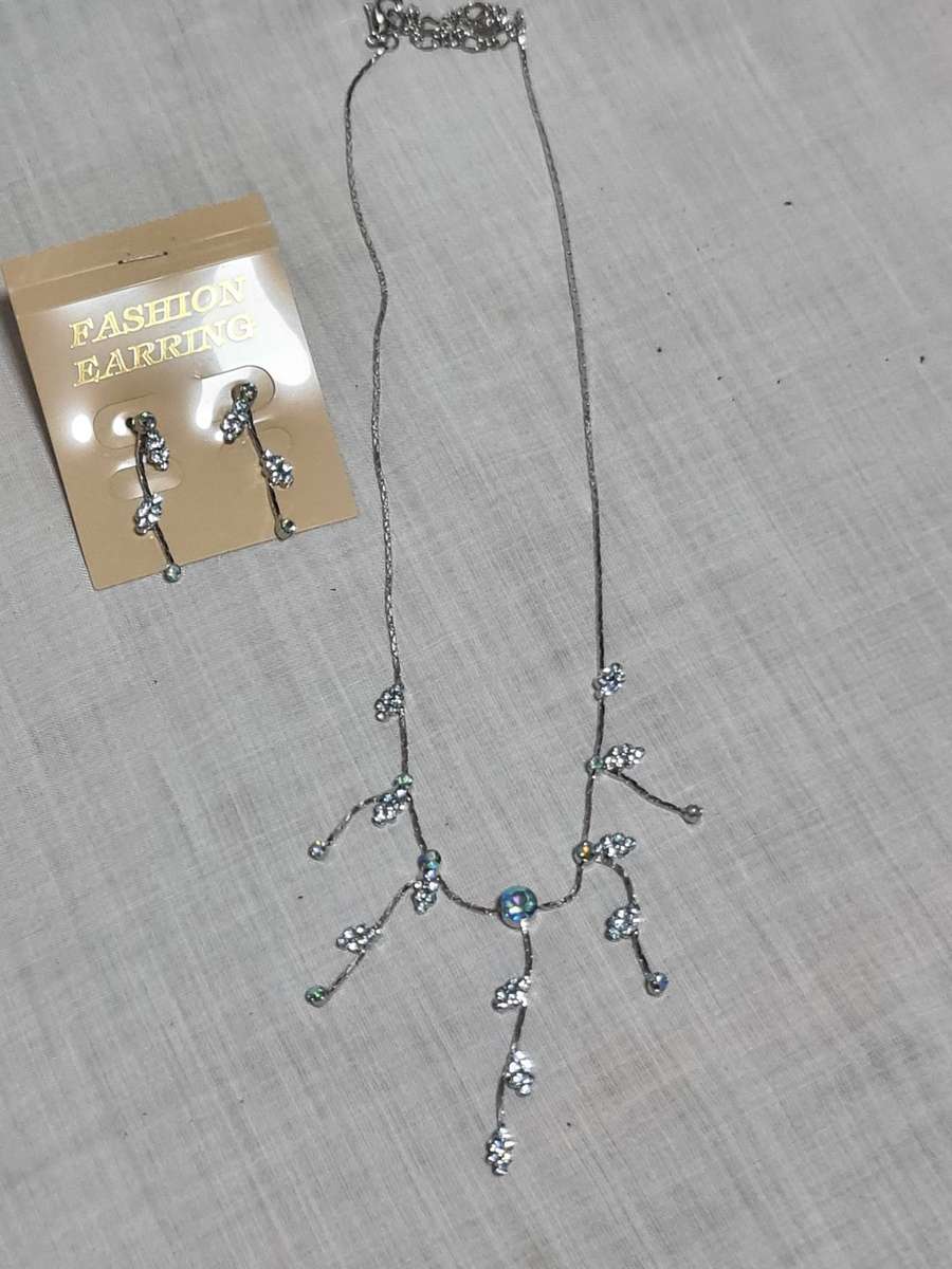 Silver Tone necklace and earrings with blue stones