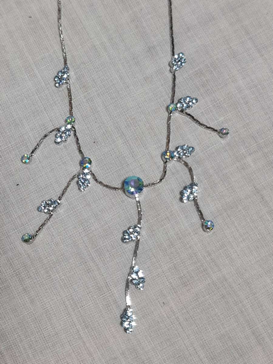 Silver Tone necklace and earrings with blue stones