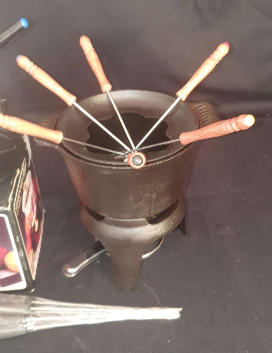 Two Vintage fondue sets