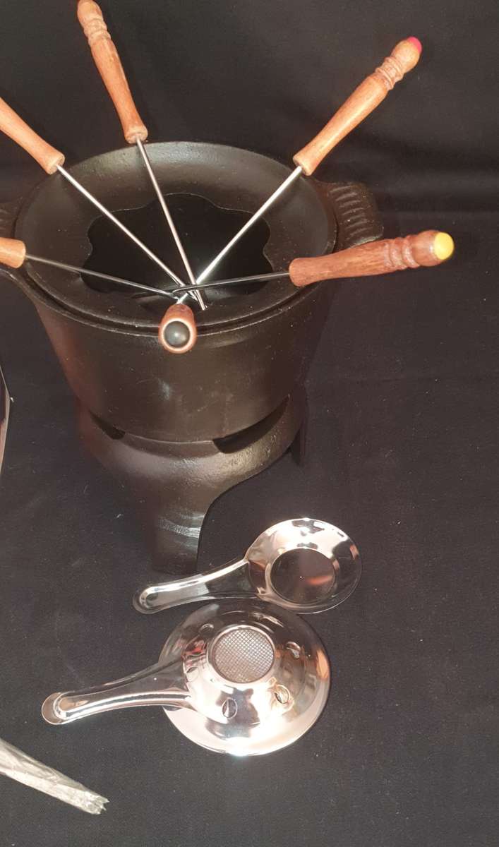 Two Vintage fondue sets