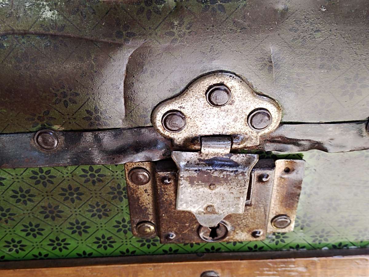 Antique metal steamer trunk