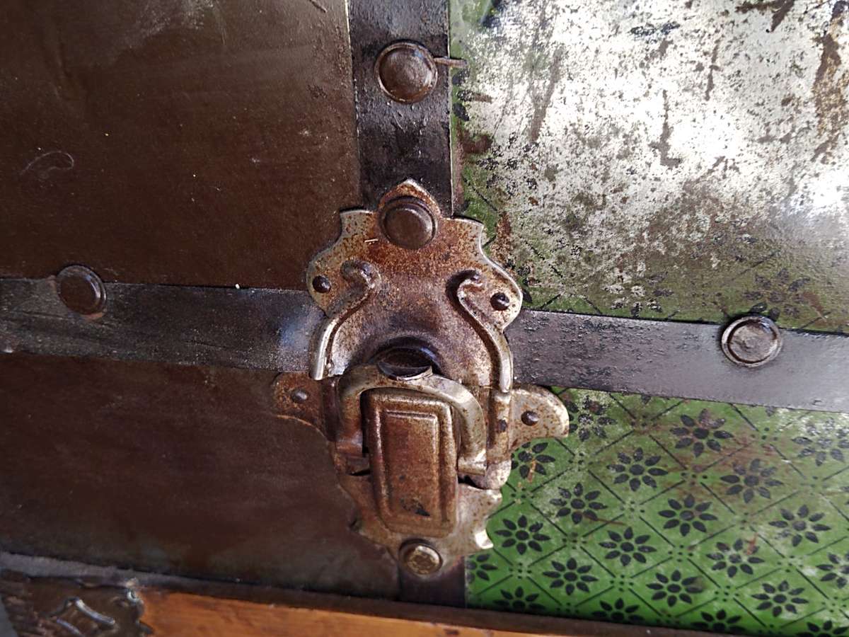 Antique metal steamer trunk
