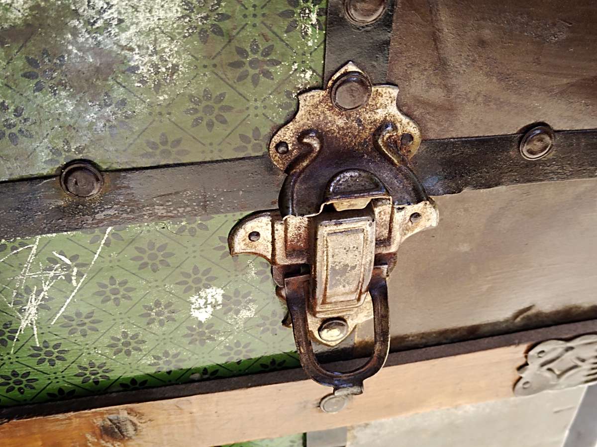 Antique metal steamer trunk