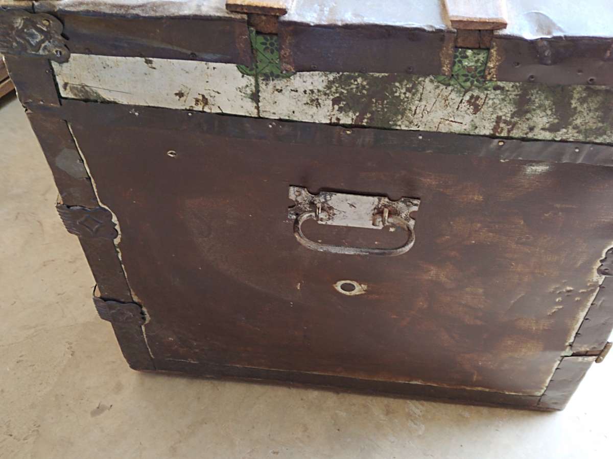 Antique metal steamer trunk