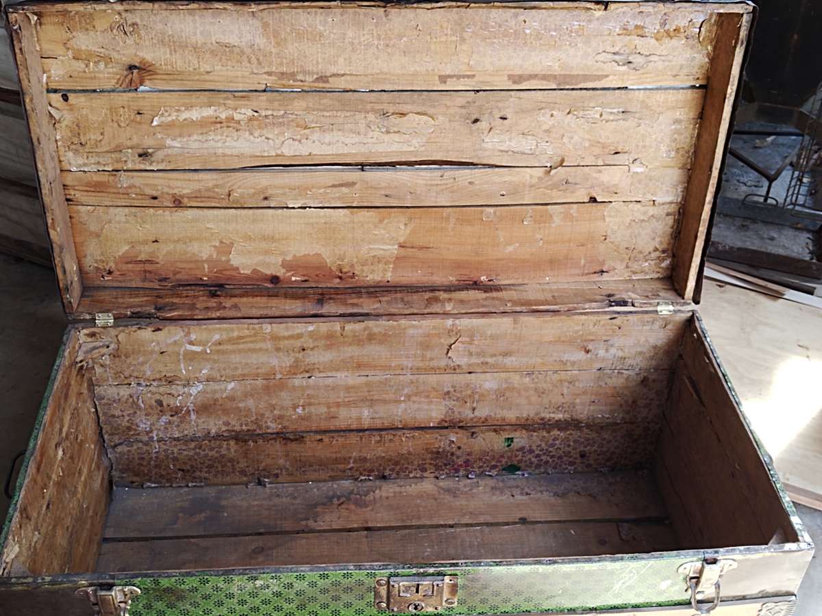 Antique metal steamer trunk