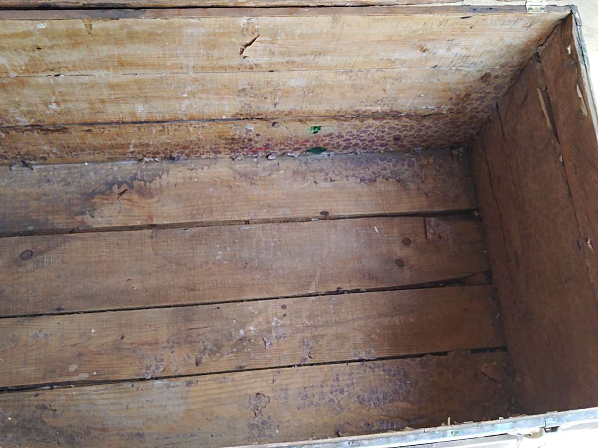 Antique metal steamer trunk