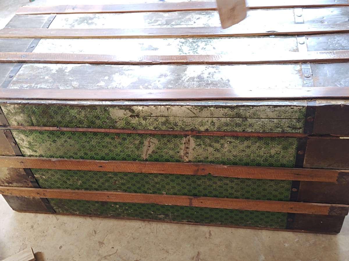 Antique metal steamer trunk