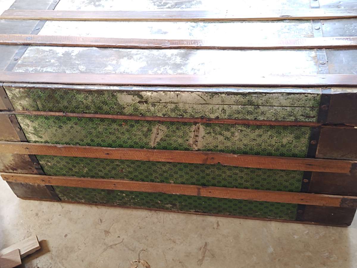 Antique metal steamer trunk